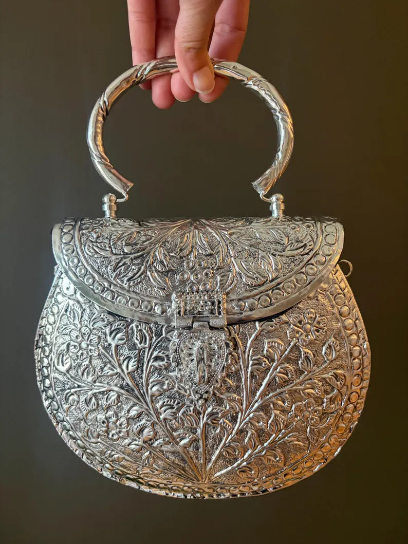 Antique Silver Embossed Statement Clutch – Handcrafted Floral Metal Bag with Ring Handle