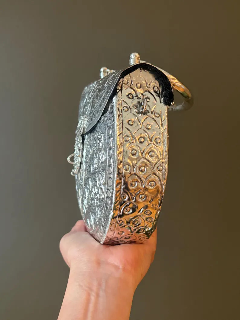Antique Silver Embossed Statement Clutch – Handcrafted Floral Metal Bag with Ring Handle