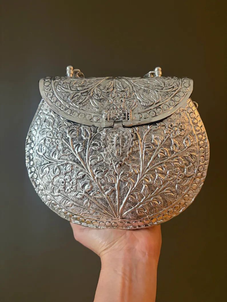Antique Silver Embossed Statement Clutch – Handcrafted Floral Metal Bag with Ring Handle